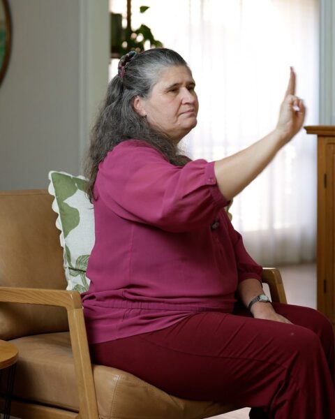 Dianne sitting and performing EMDR therapy